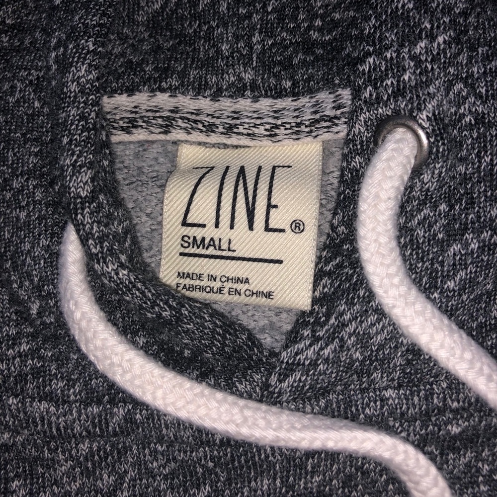 grey sweatshirt